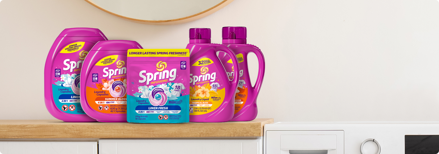 Image of the Spring line of laundry products, sitting on a laundry room countertop