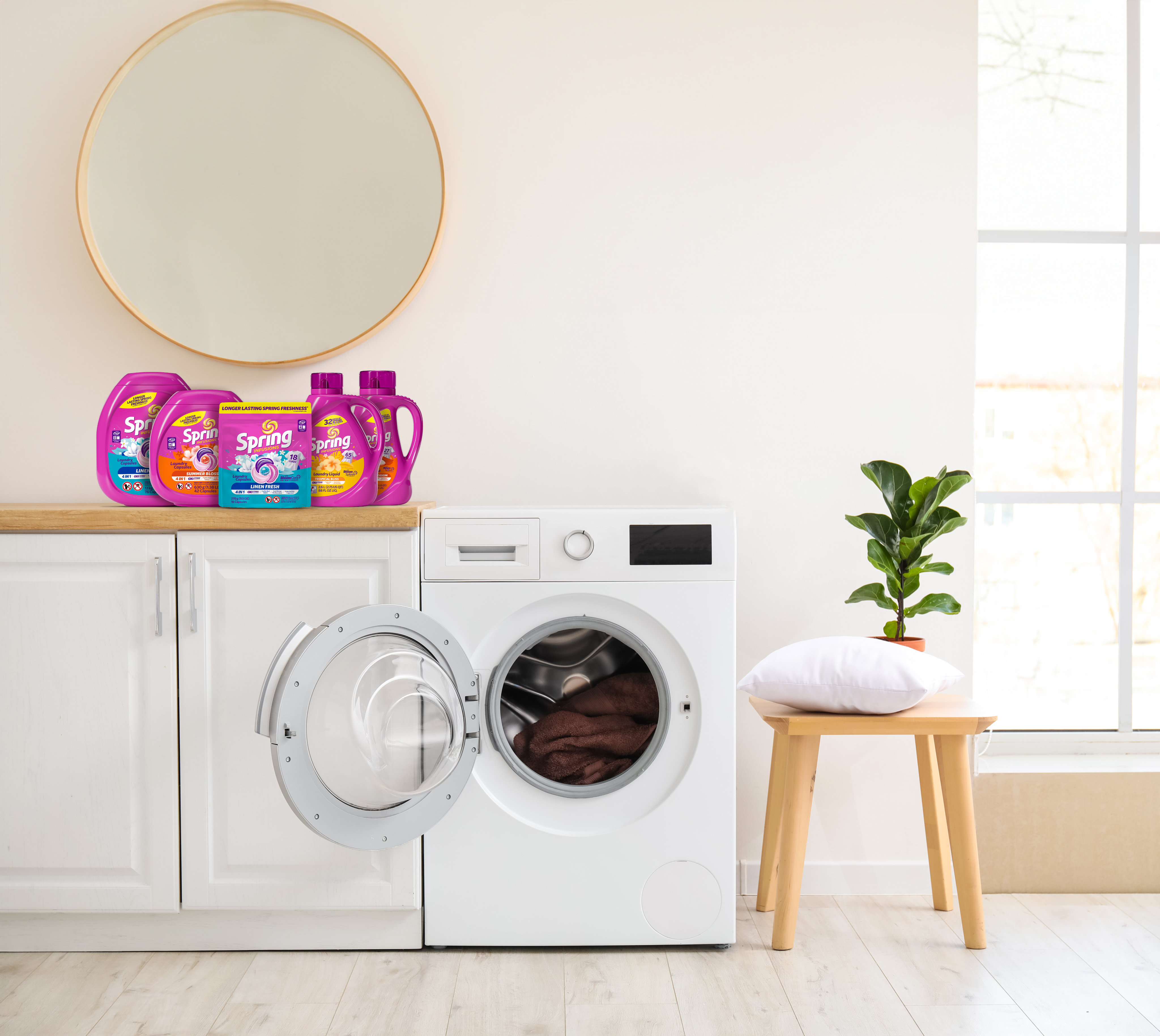 Image of the Spring line of laundry products, sitting on a laundry room countertop
